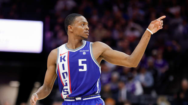 Feb 26, 2024; Sacramento, California, USA; Sacramento Kings guard De'Aaron Fox (5) reacts after scoring a basket during the fourth quarter against the Miami Heat at Golden 1 Center. Mandatory Credit: Sergio Estrada-USA TODAY Sports  